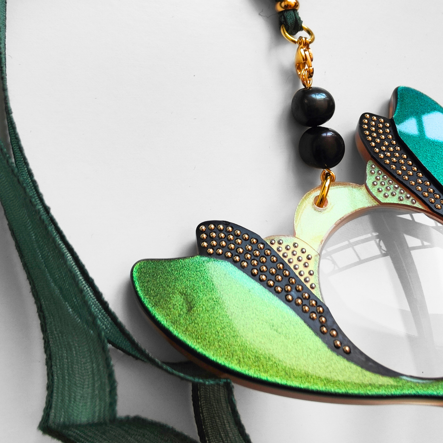 COLGANTE-LENTES MOSCA VERDE FL00465C